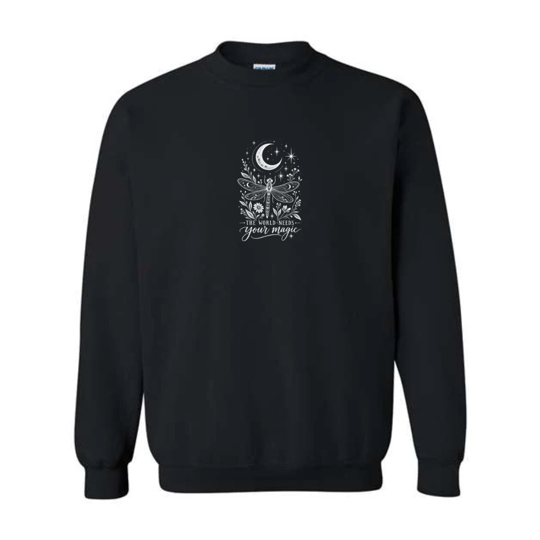 The World Needs Your Magic design on black crewneck sweatshirt
