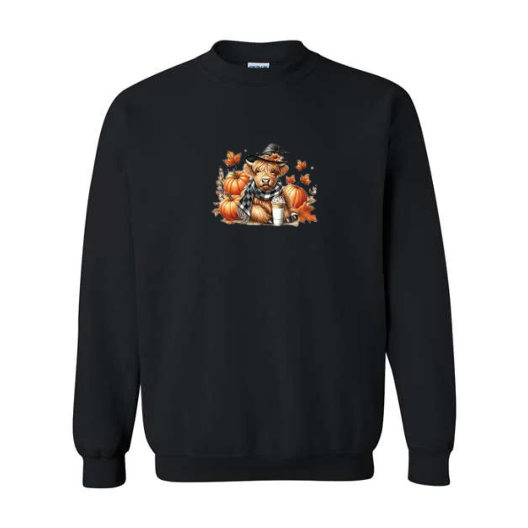 Cozy Highland Cow design on black crewneck sweatshirt