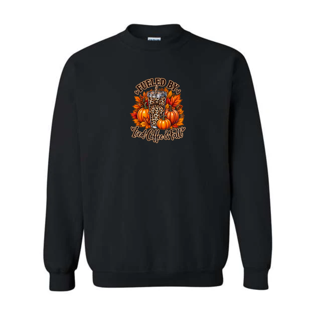Fueled By Iced Coffee & Fall design on black crewneck sweatshirt