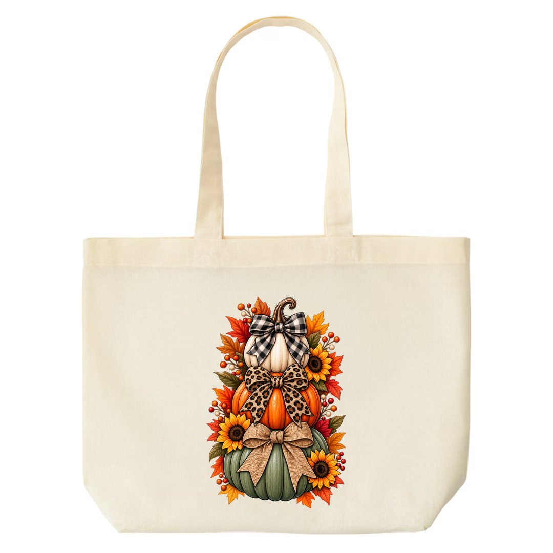 Stacked Pumpkins With Bows design on natural canvas tote
