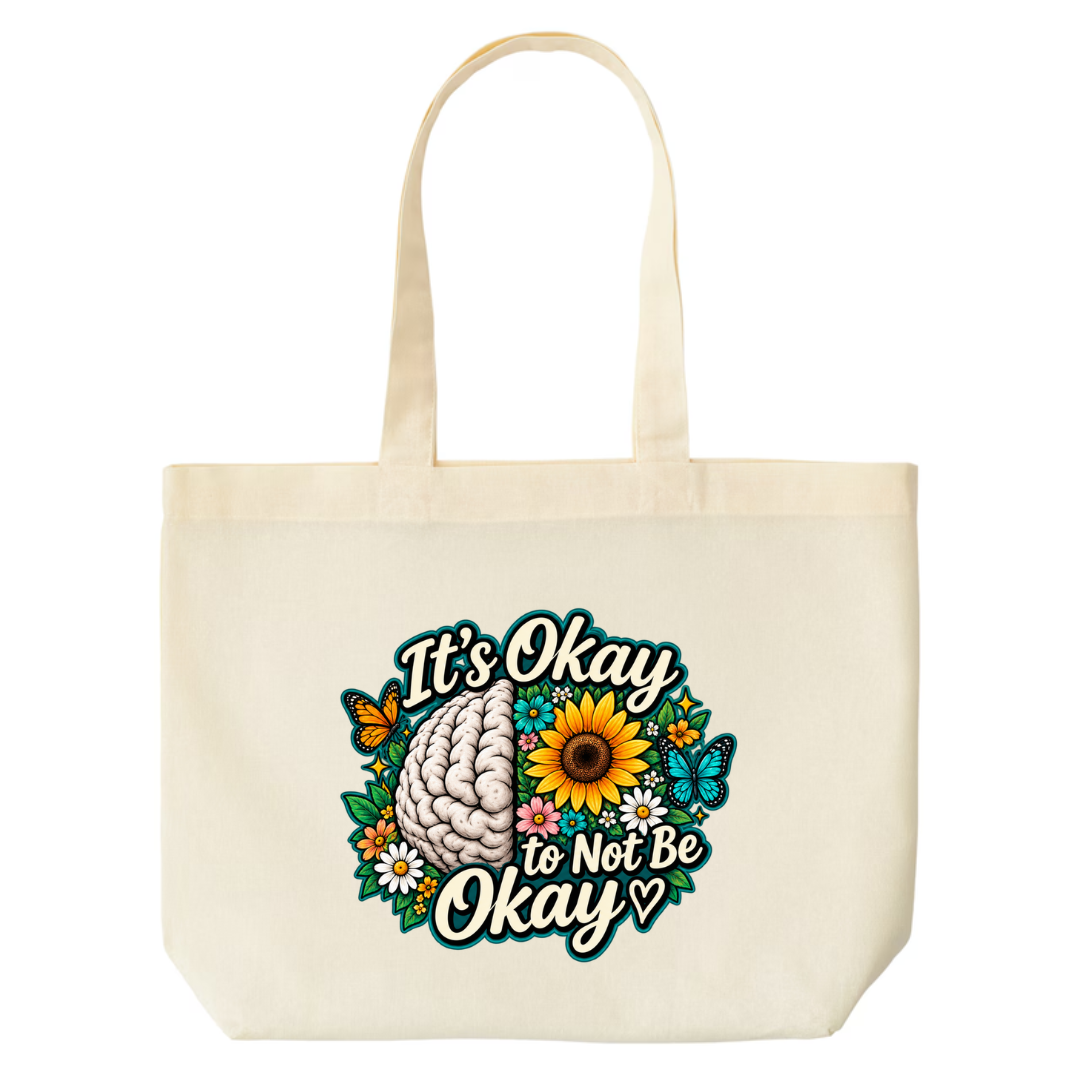 It's Okay to Not Be Okay design on natural canvas tote