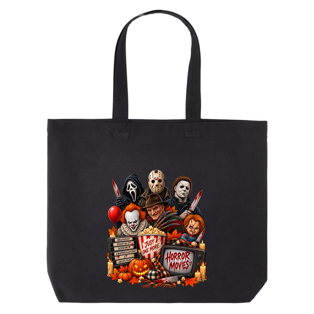 Just One More Horror Movie design on black canvas tote