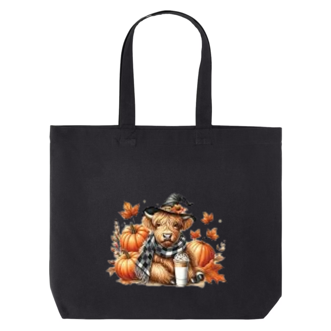 Cozy Highland Cow design on black canvas tote