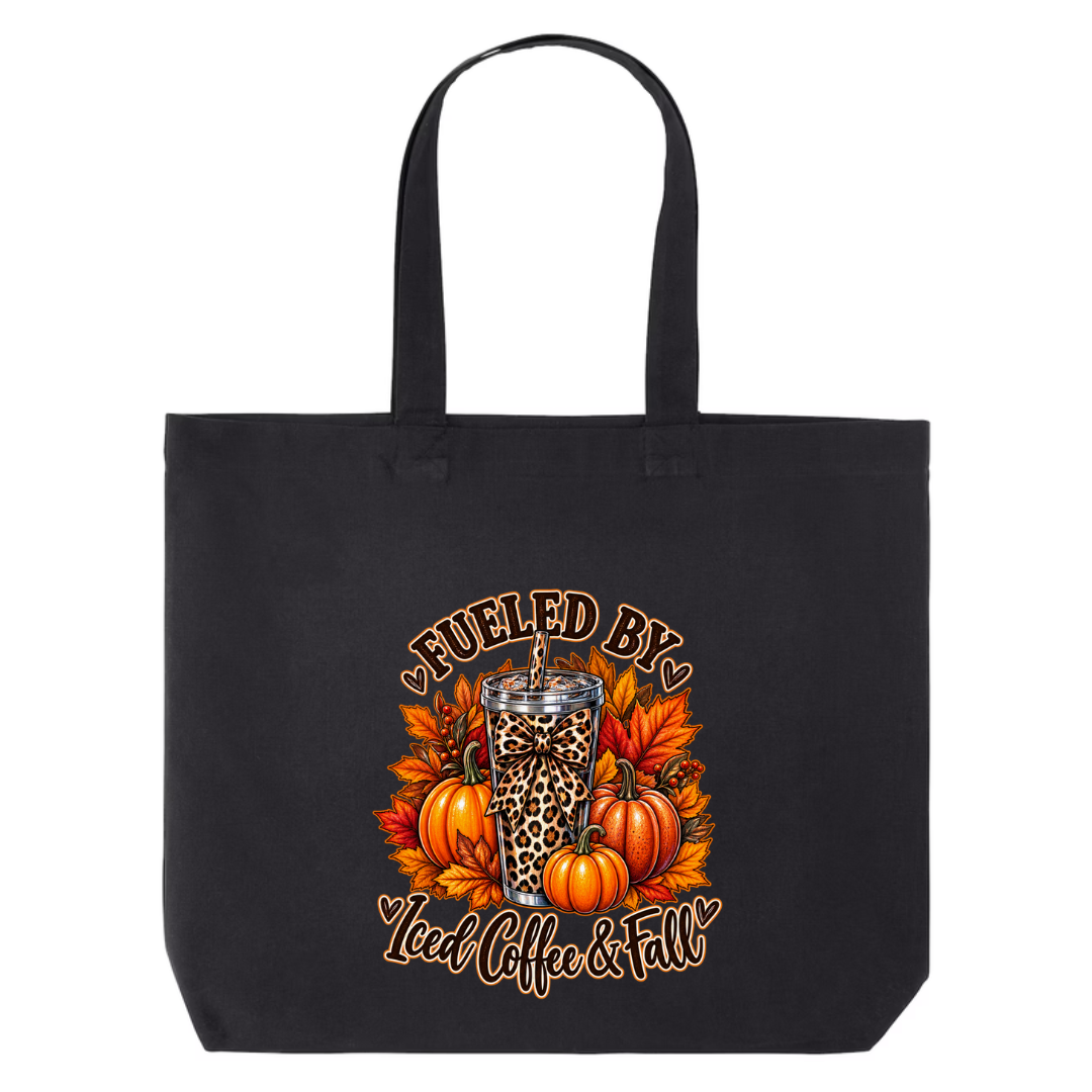 Fueled By Iced Coffee & Fall design on black canvas tote