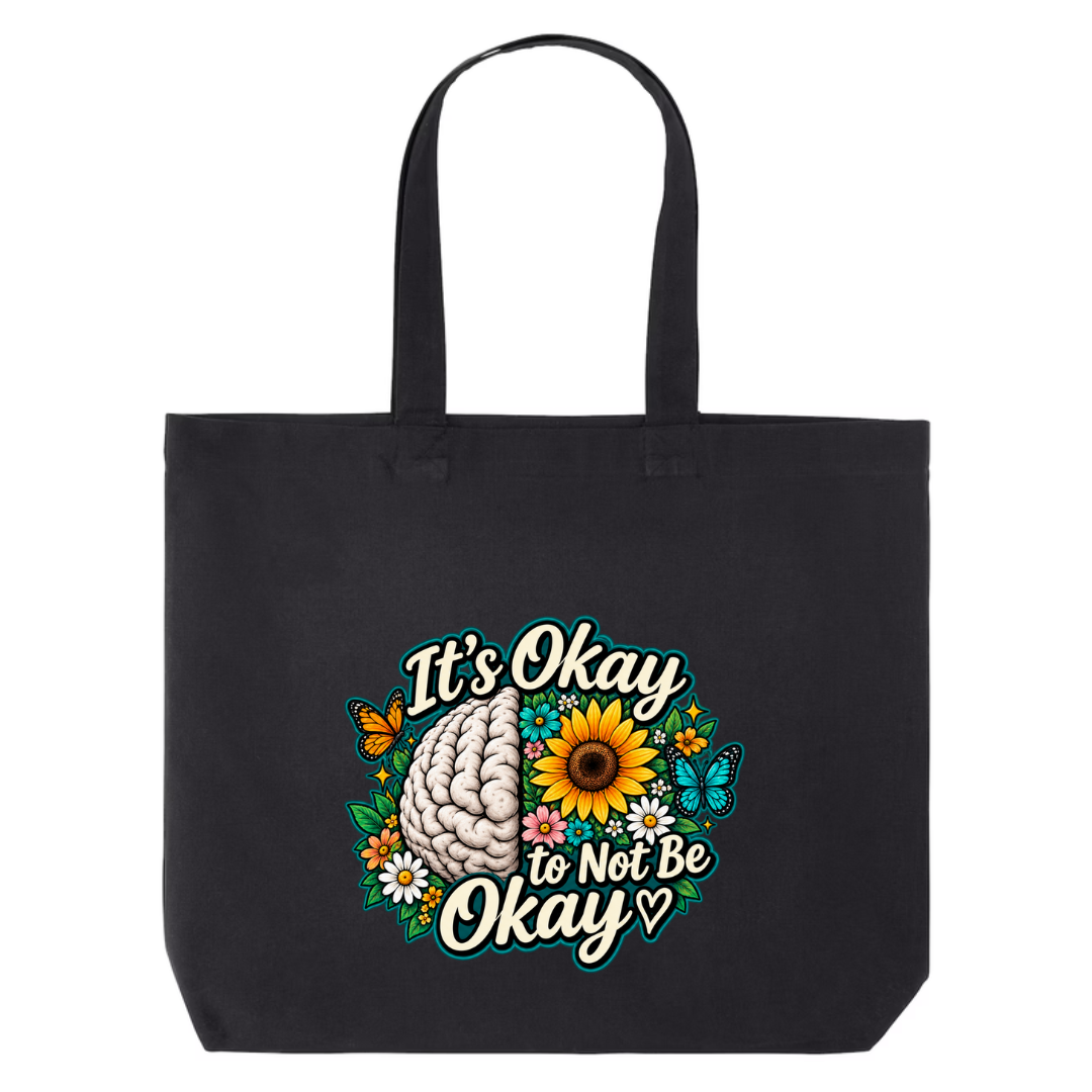 It's Okay to Not Be Okay design on black canvas tote